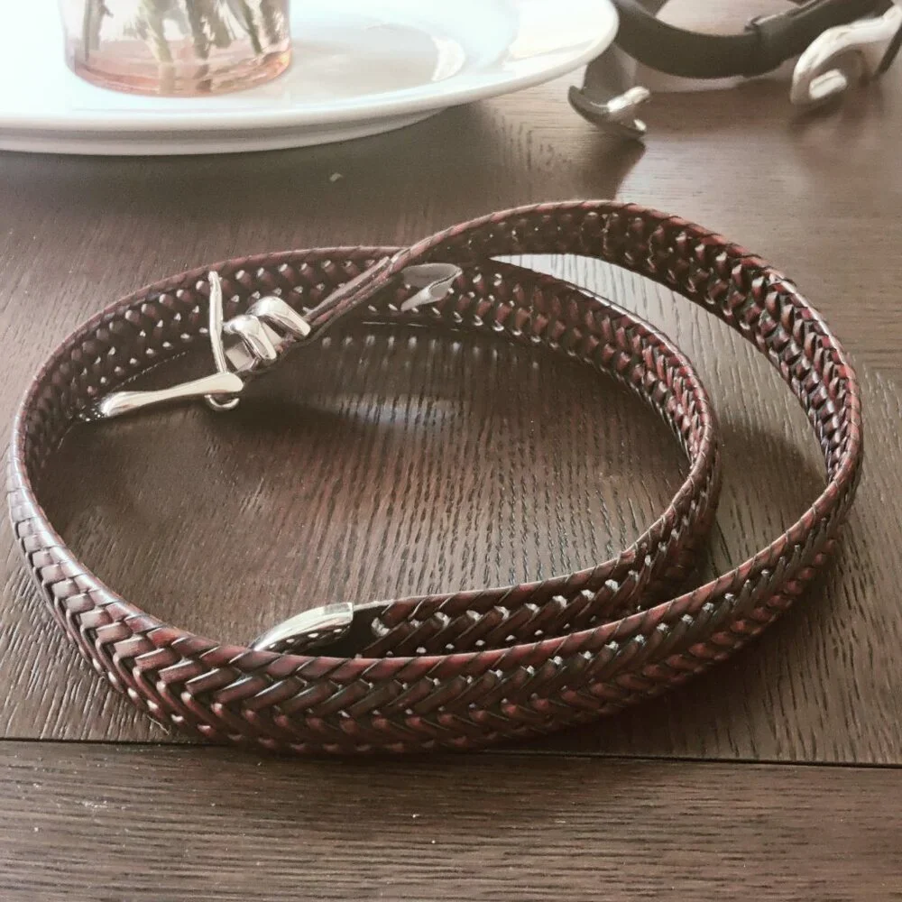 Leather Belt by Perry Ellis in a woven design with a belt buckle in Silver